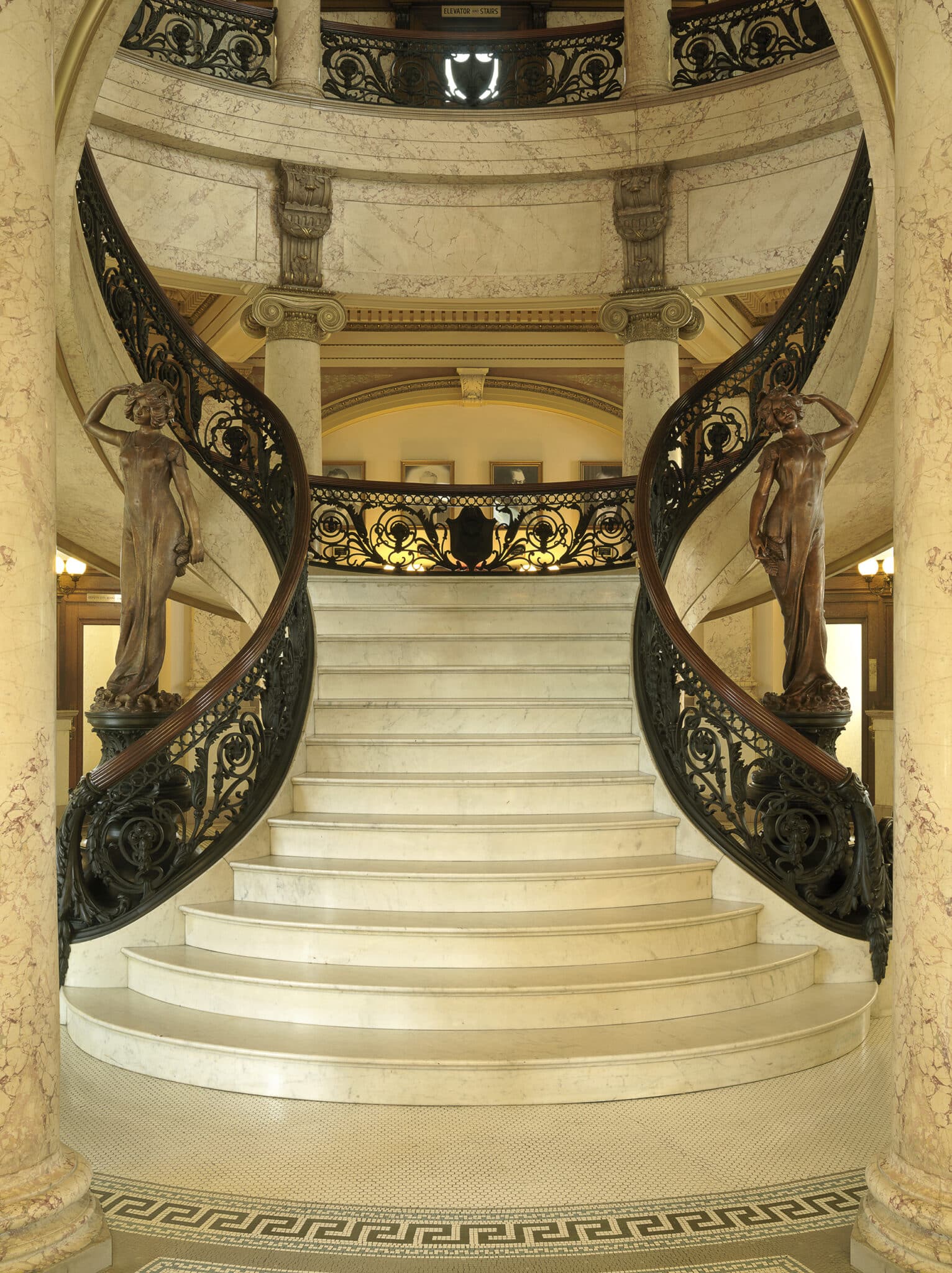 city hall building stair case designed by trivers architectural firm in st. louis
