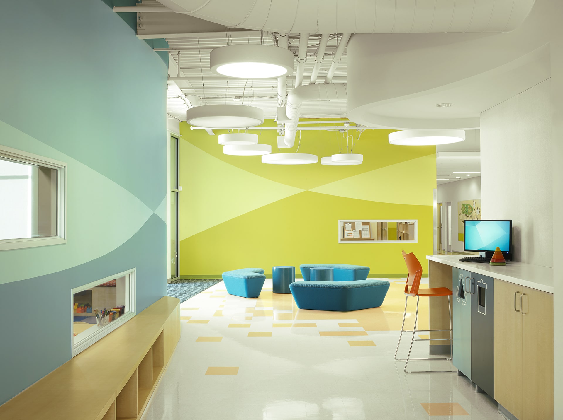 library of early childhood school designed by trivers architectural firm