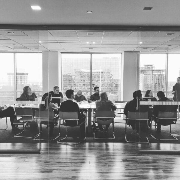 trivers employees in a meeting (black & white)