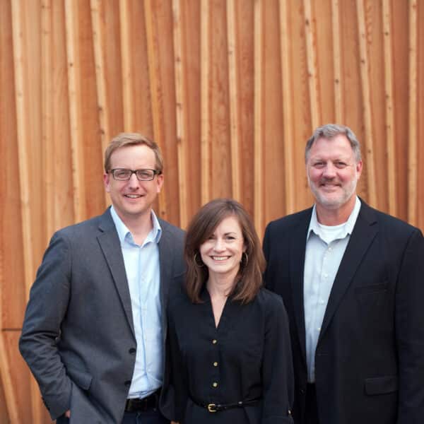 Founders of Trivers Standing in front of Background